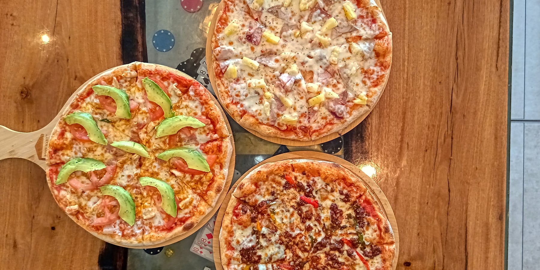 Trio of Fresh Woodfired Gourmet Pizzas